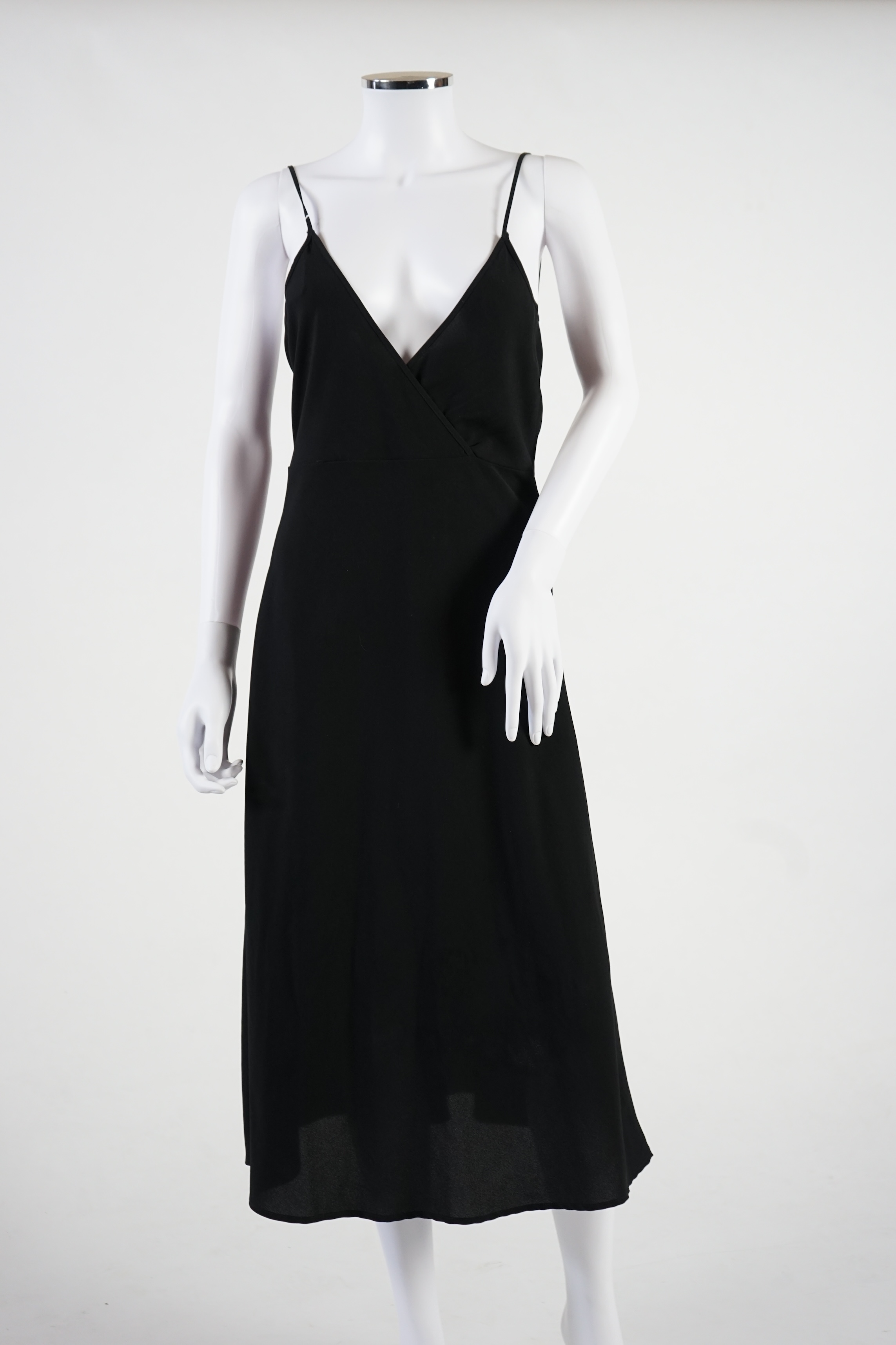 A Red Valentino black lace dress with under slip. Proceeds to Happy Paws Puppy Rescue